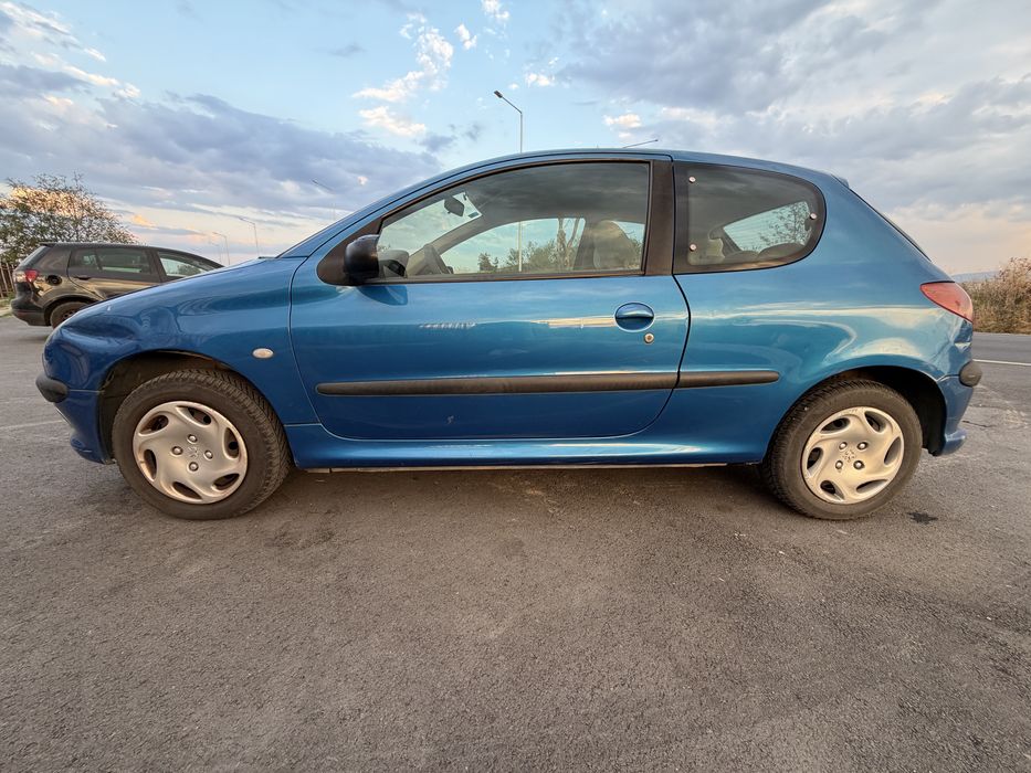 Peugeot 206 1.4 Бензин 75к.с.