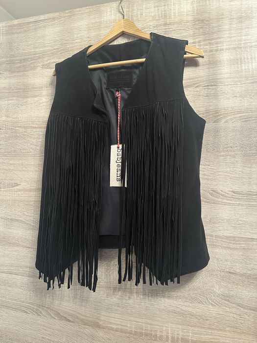 Vesta din piele intoarsa