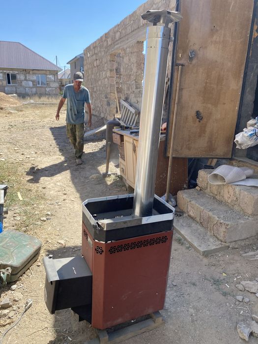 Продаю печка бани с 3мя трубами новая