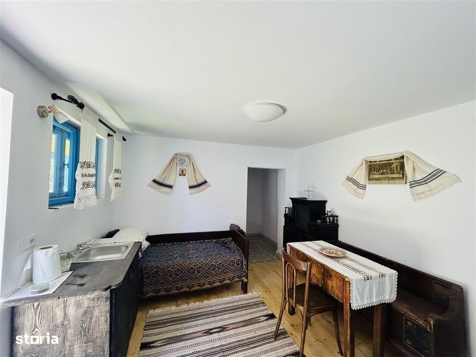 Casa individuala cu 2 corpuri de cladire si teren 625 mp