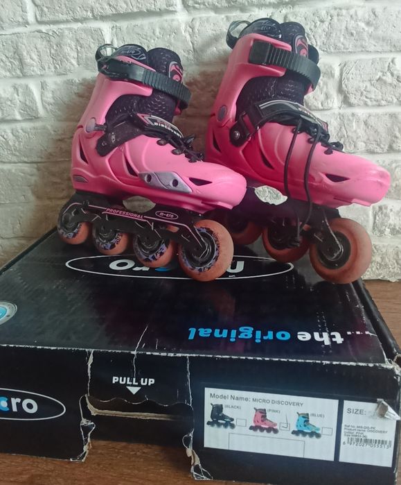 Роликовые коньки