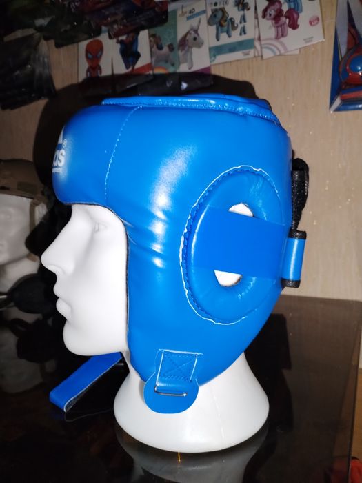 Шлем защитный для спортивных единоборств. Новые