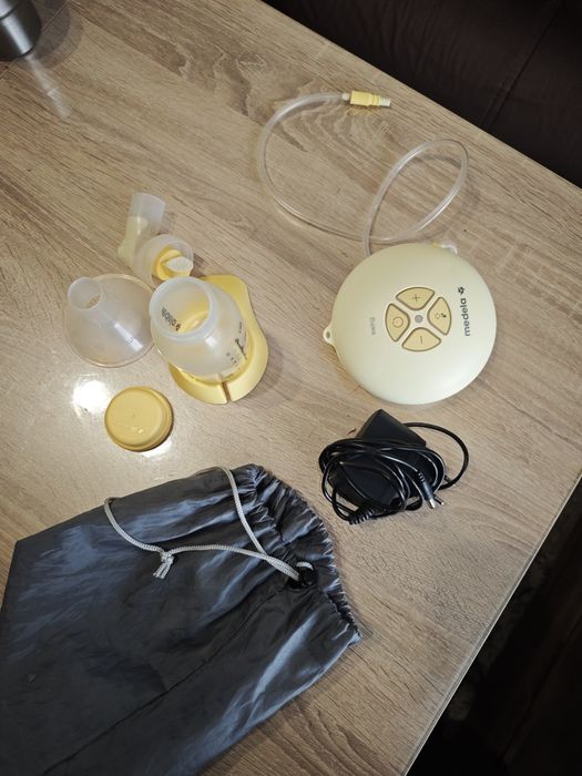 Помпа за кърма Medela Swing