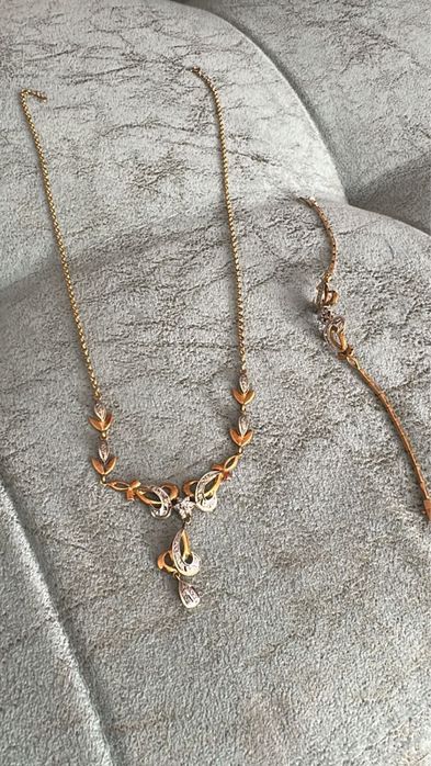 Продам золотое колье и браслет