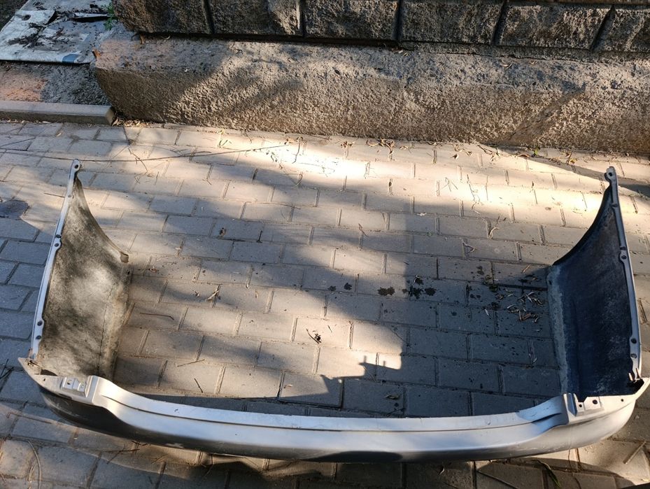 nissan a33 задний бампер