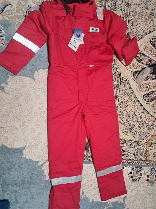 Продам зимний комбинезон мужской