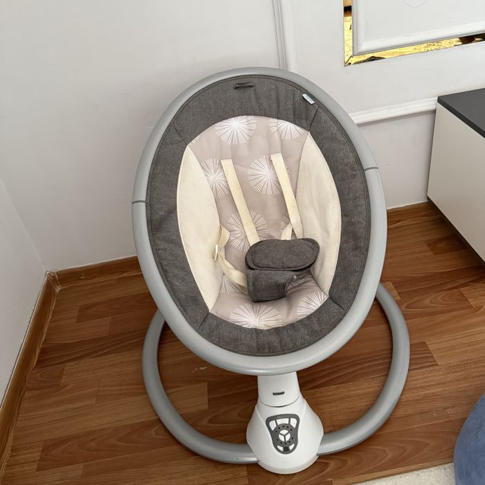 Шезлонг электронный для малышей.