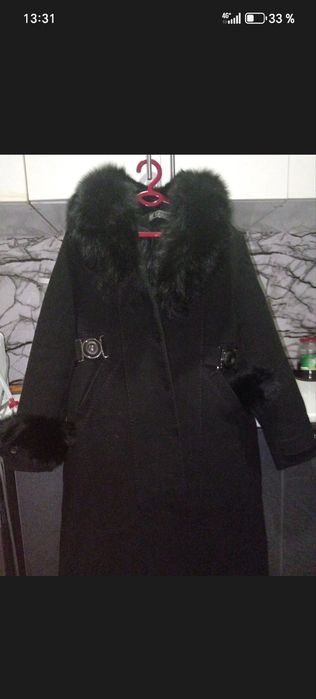 Ayollar qalin paltoʻsi 50-52 ga yuradi