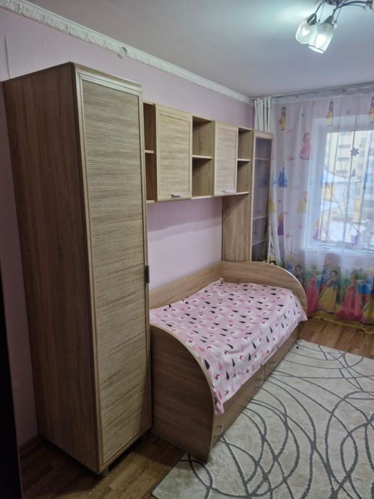 Кровать со шкафами и ящиками