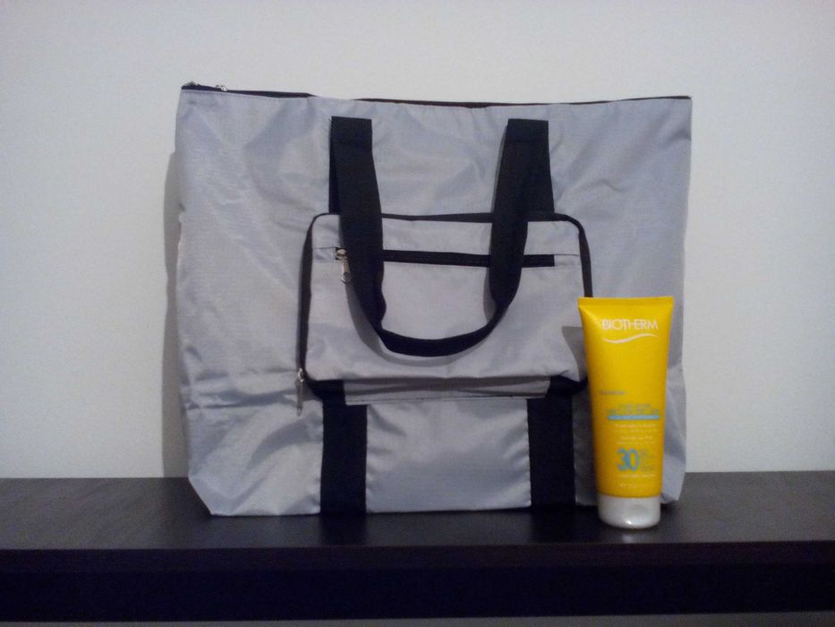 Промо оферта: Biotherm Fluide Solaire SPF 30 Wet or Dry Skin + чанта