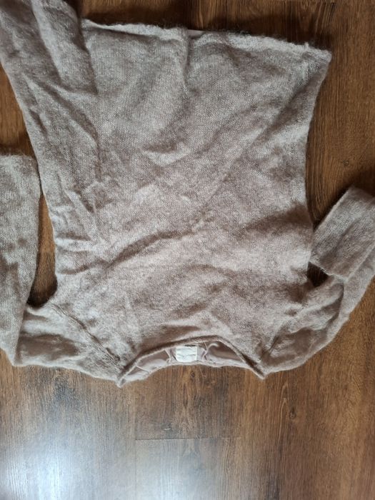 Дамски пуловери .