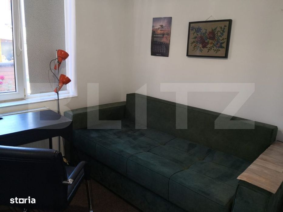 Garsoniera la casa cu curte si terasa in zona Centrala
