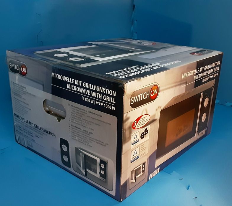 Cuptor cu microunde cu functie grill SWITCHON NOU - 295 Lei