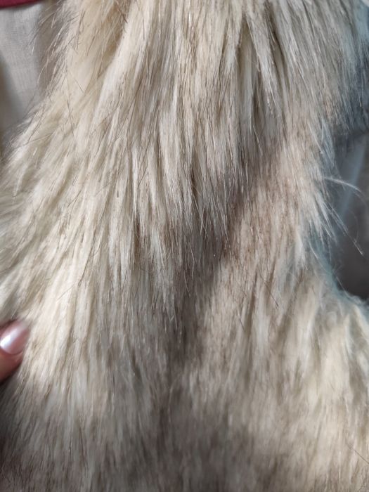 Дамски пухен елек