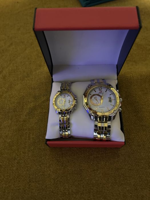 Ceas Geneva pentru cupluri.Din quartz,aur si argint. Niciodata purtat