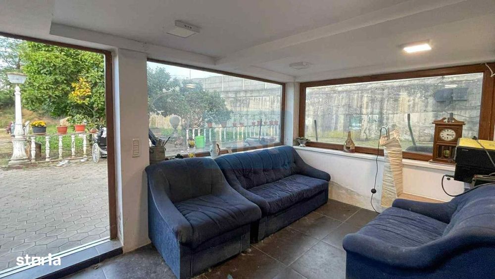 Casa 7 camere, teren 590 mp in Calnic