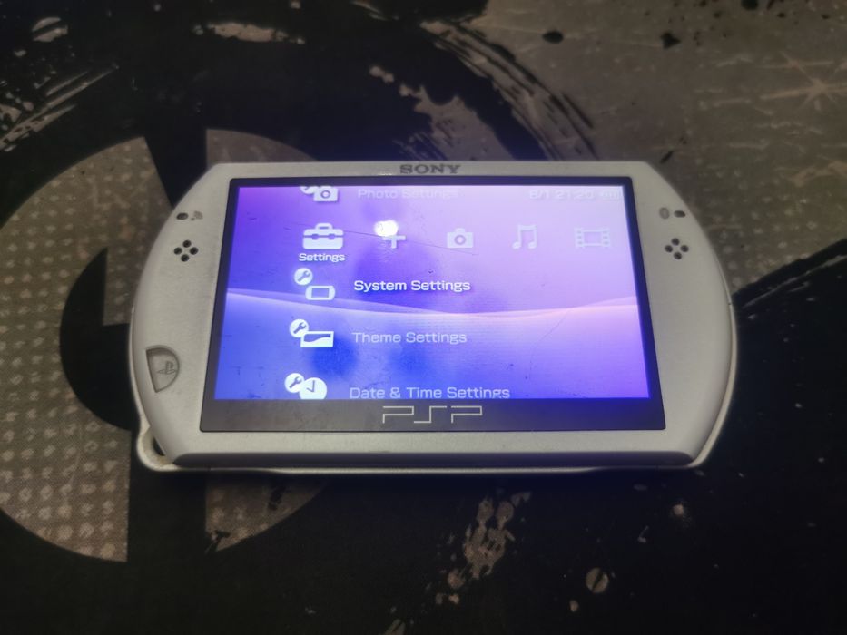 PSP-N1004 GO 2005 Г