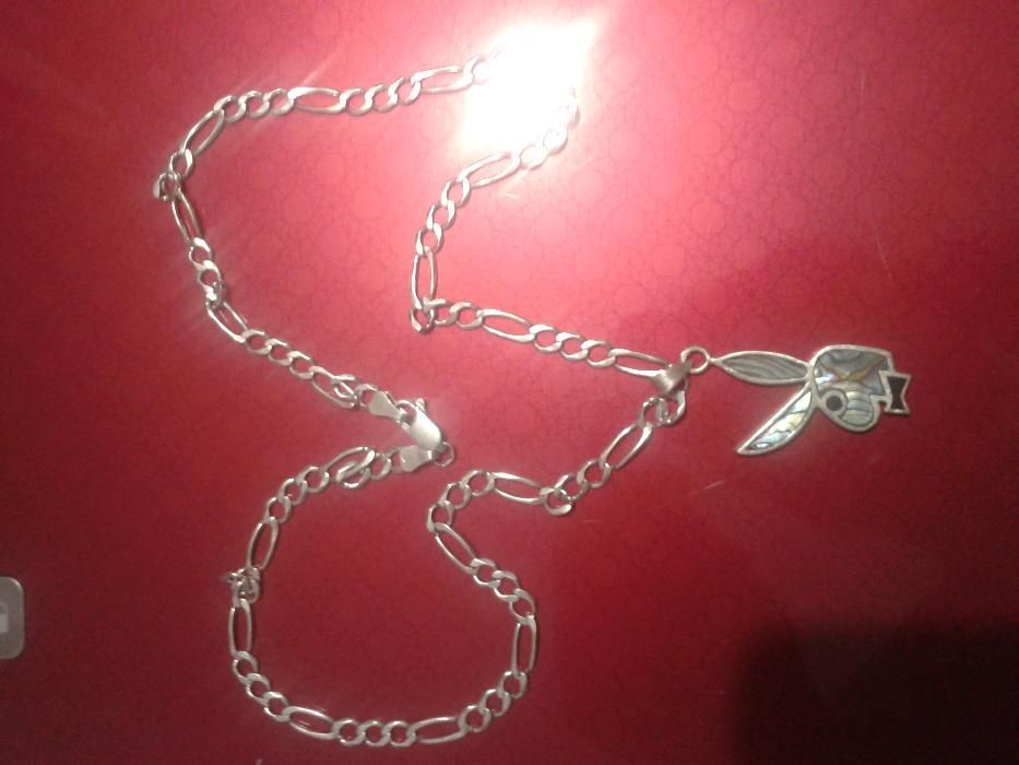 Vând pandantiv playboy cu lant de argint