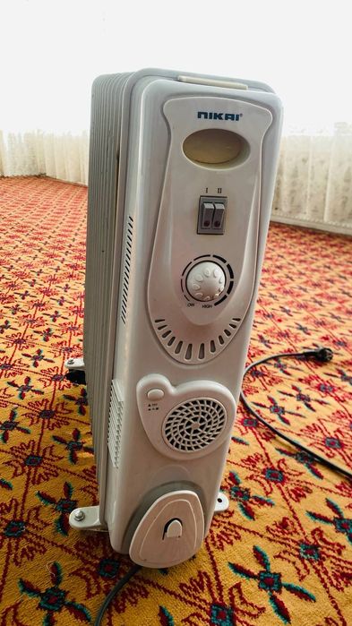 Масленный обогреватель