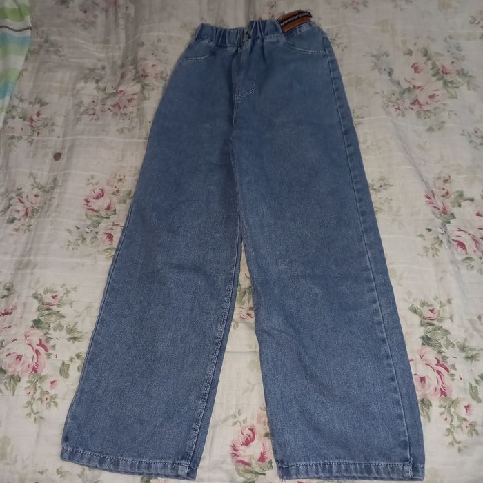 Джинсы новые на девочку 8 лет