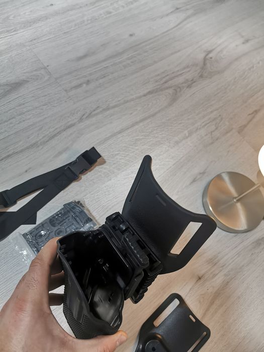 Holster universal cu acțiune rapida universal+platforma.