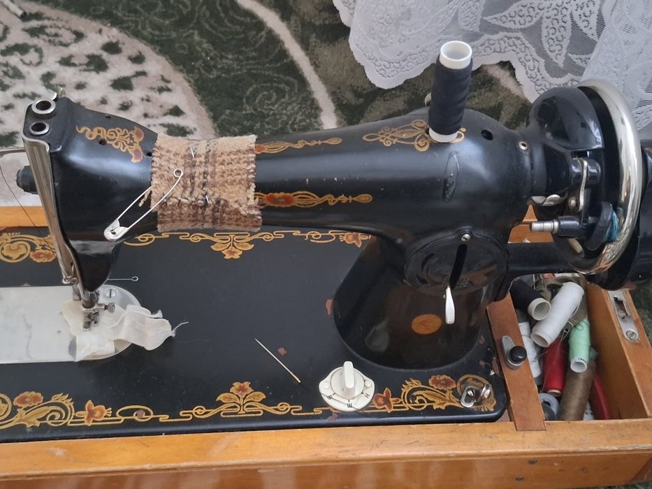 Швейная машина .