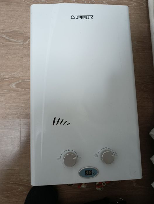 Продам газовый проточный водонагреватель