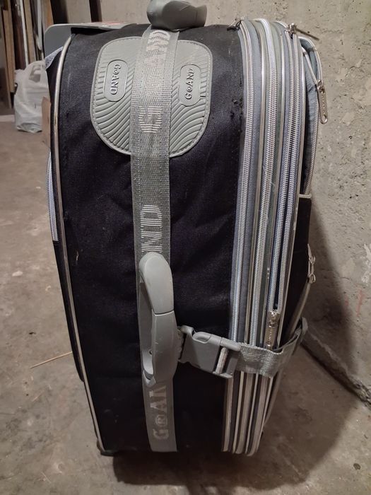 Пътнически куфар с колелца