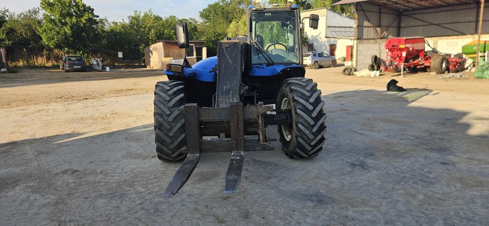 Incarcator telescopic new holland LM 415 A