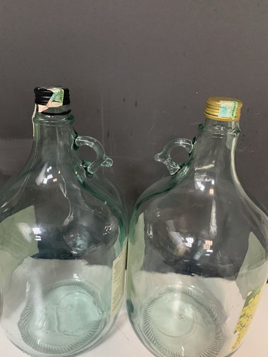 Продам стеклянные бутылки 5л