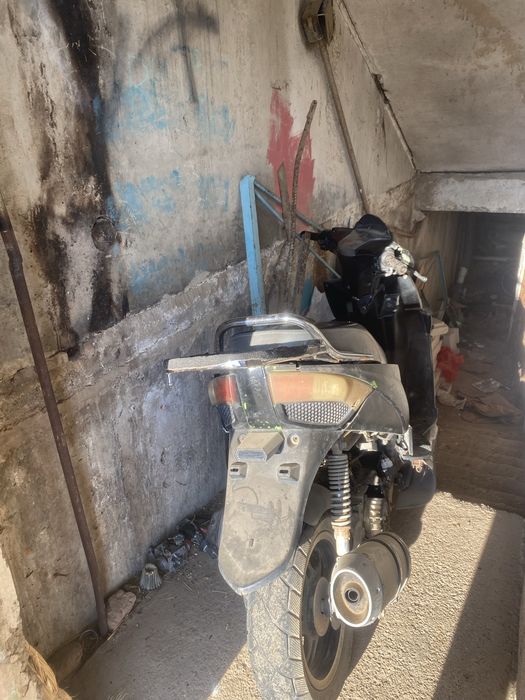 Скутер мопед или телефон