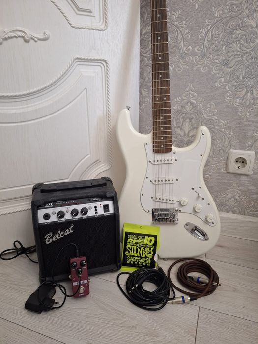 Гитара в наборе + струны в подарок!