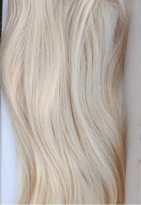 Естествена коса на треса.Дълга 60 см.