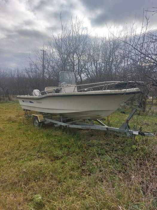 Barcă Open Fisherman 6 m + peridoc + motor Bombardier Johnson 40 CP