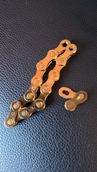 lant KMC e12 Ti-N gold 12-speed E-Bike Chain - 130 links, quick link