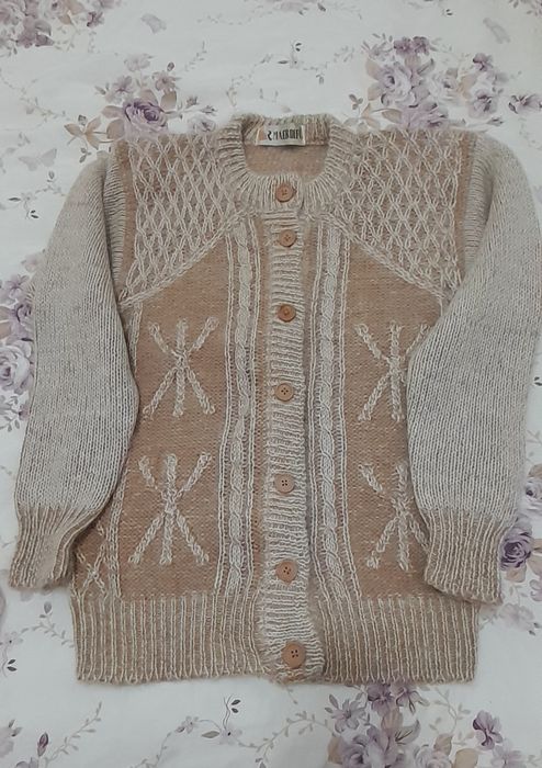 Нова.   жилетка ...