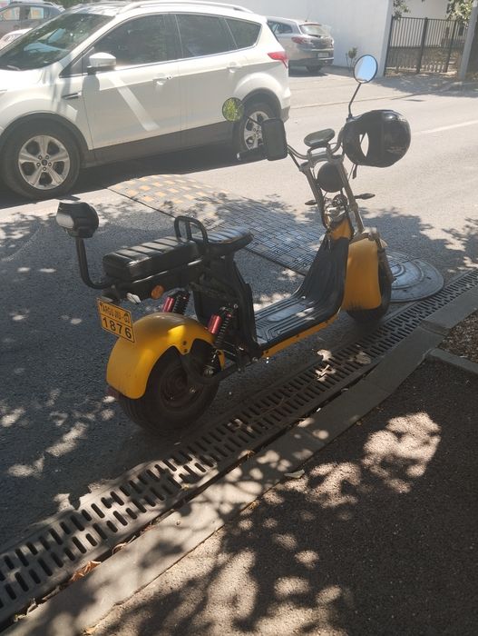 Dau la schimb scuter electric  pe  scuter pe benzina limitat