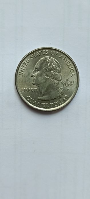 Продам юбилейную монету 25 Cent USA
