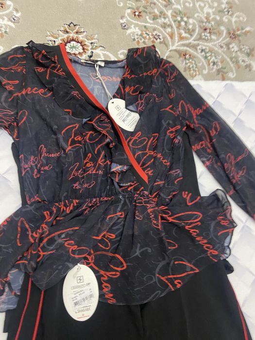 Новый нарядный костюм 38 р