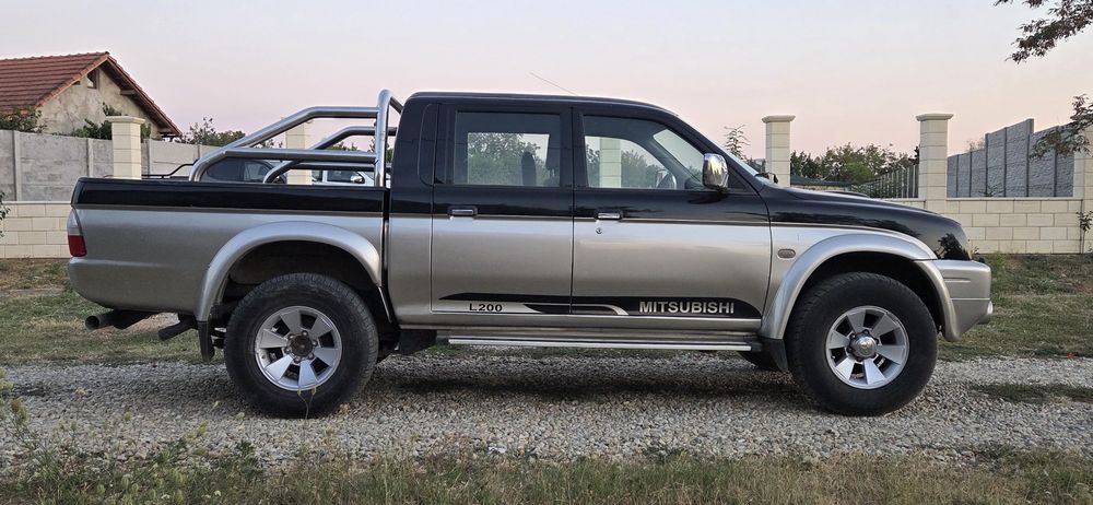 Mitsubishi L 200 climatronic 4x4 cuplaj la mare la mic Diferitial blocabil la buton