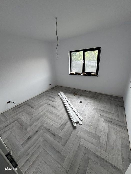 Casa cu 4 camere, curte de 400 mp, nouă în Clinceni