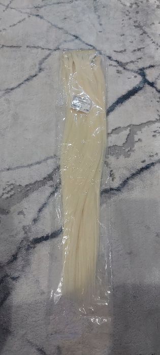 Продам искусственные волосы новые