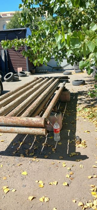 Продам трубы и гаражные ворота.