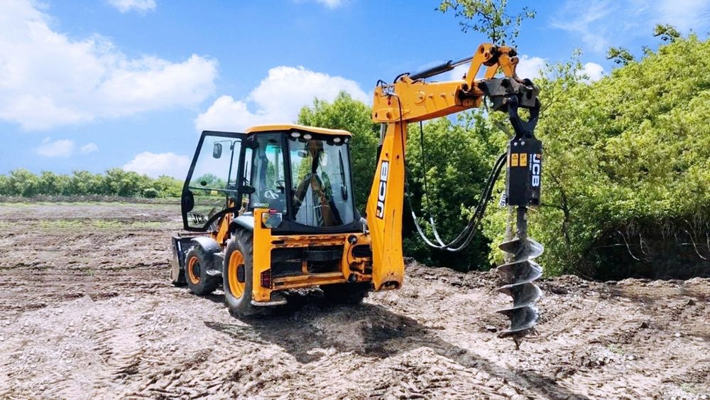 Экскаватор-погрузчик 3в1