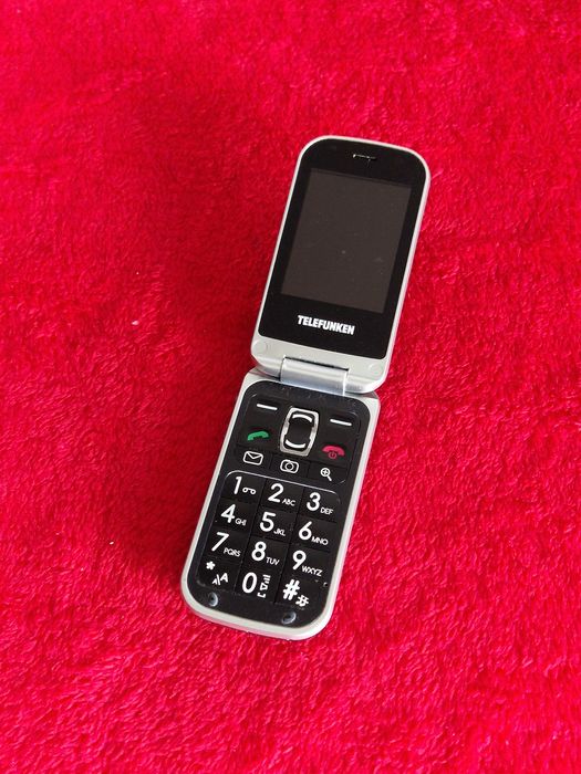 Telefon cu clapeta perfect funcțional