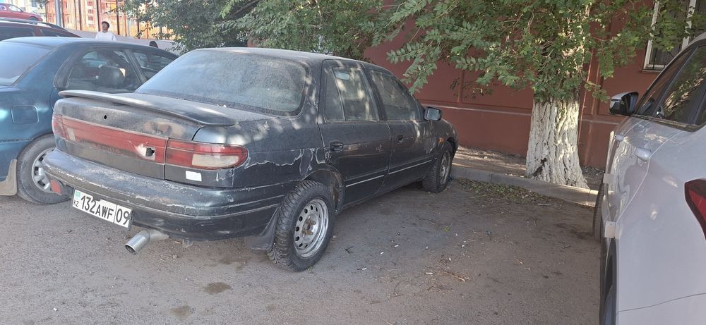 Автомобиль kia sefira