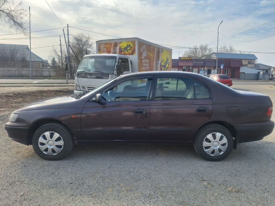 Продам тойоту карина е