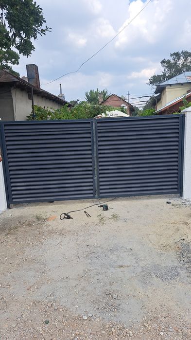 Construim porți la comanda clientului ne deplasăm în toată țara porți din șipcă metalică porți din lamele porți din
