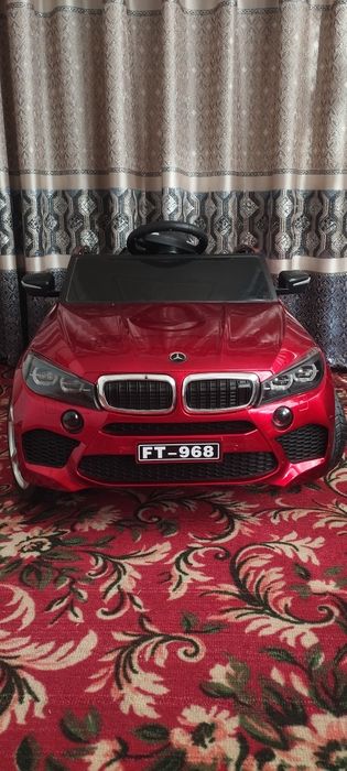 Bolalar mashinasi pulti bilan