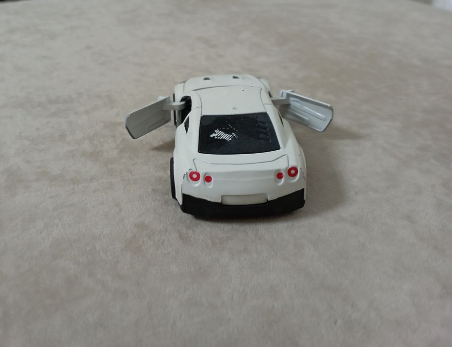 Железная машинка Nissan gtr am3 sport игрушка.